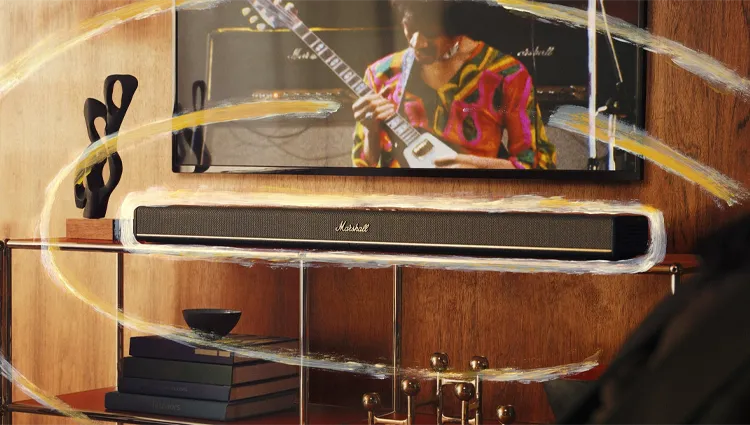 promotieafbeelding van de Marshall Heston soundbar onder een tv met livemuziek
