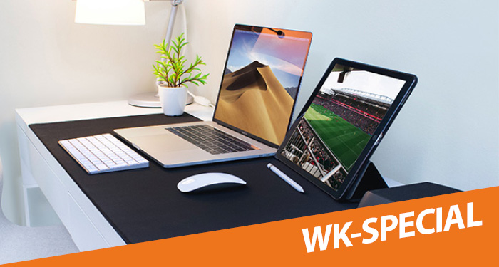 Een laptop en tablet voor het kijken naar voetbal